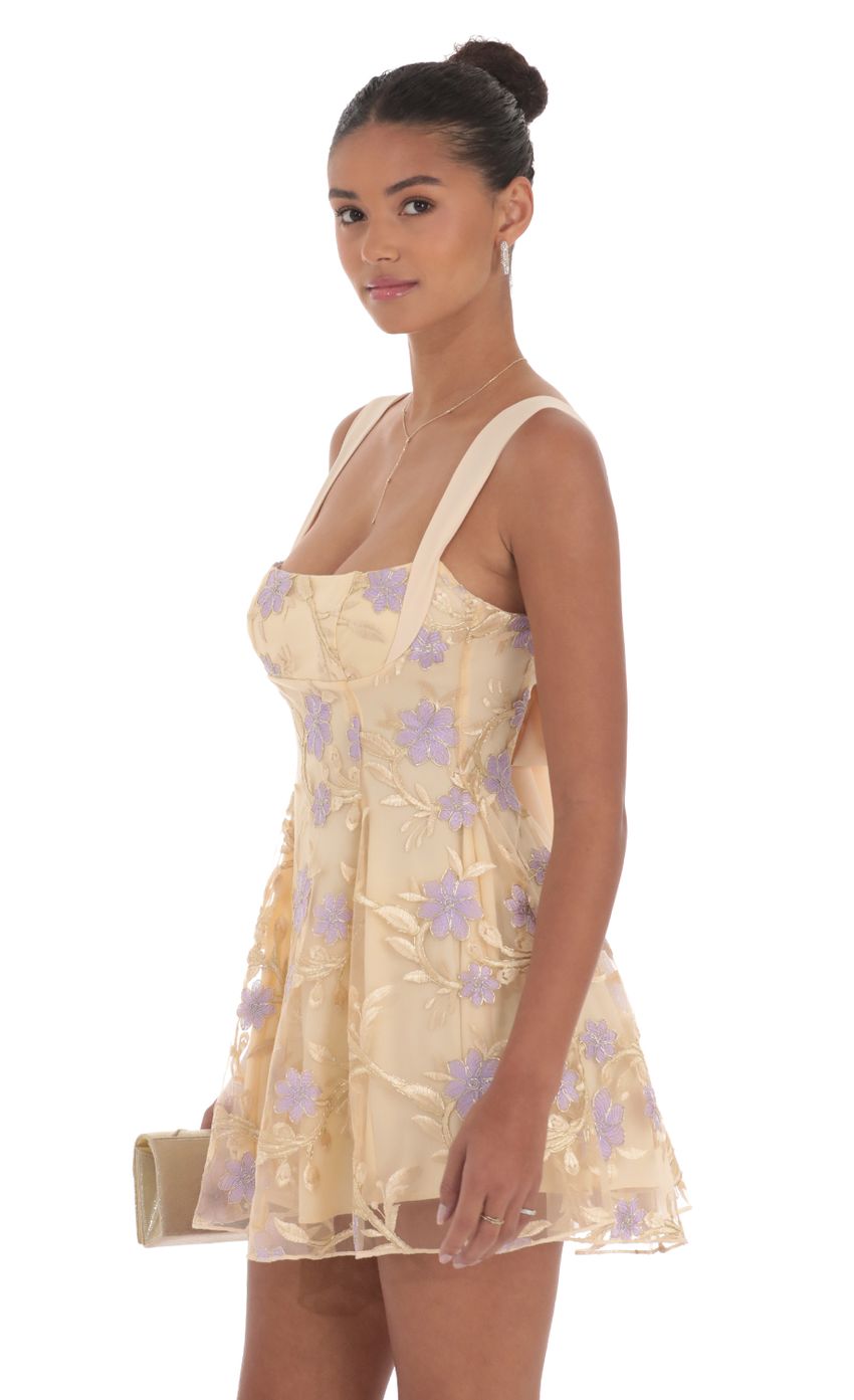 Picture Embroidered Floral Fit and Flare Dress in Gold. Source: https://media-img.lucyinthesky.com/data/Sep24/850xAUTO/e4a39bd5-665a-4e8c-9aed-348bfe44592f.jpg