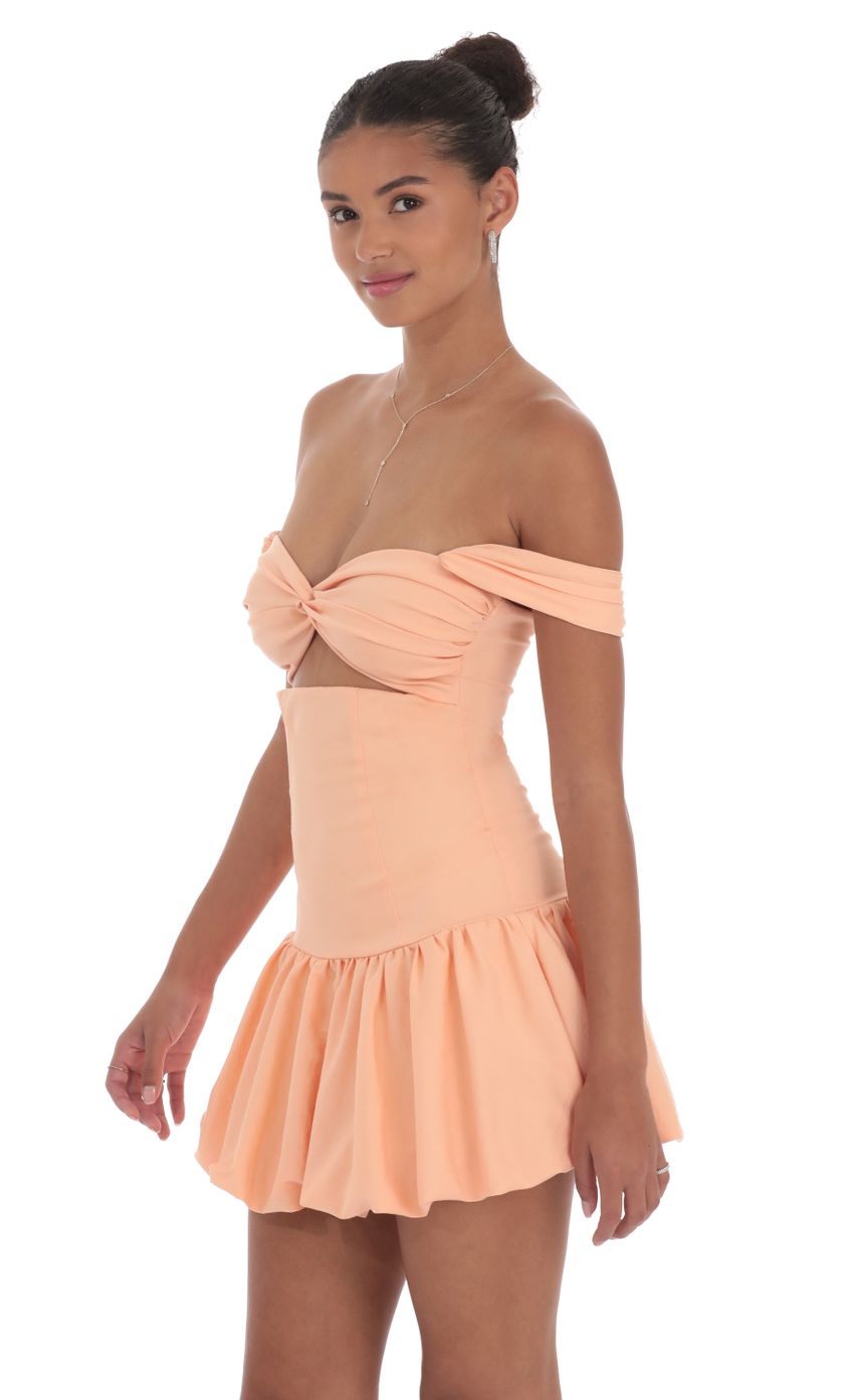 Picture Off Shoulder Cutout Bubble Dress in Orange. Source: https://media-img.lucyinthesky.com/data/Sep24/850xAUTO/e7bed591-700d-4395-8968-7268327d7fb4.jpg