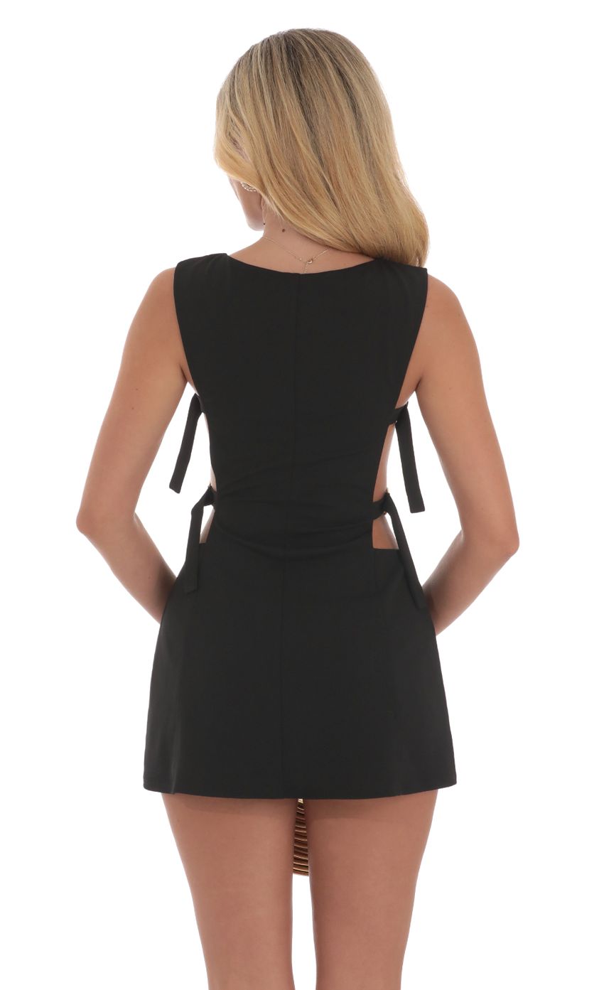 Picture Buckle Cutout Dress in Black. Source: https://media-img.lucyinthesky.com/data/Sep24/850xAUTO/f2ee16ce-5136-4d10-90bf-730c7426ea8b.jpg