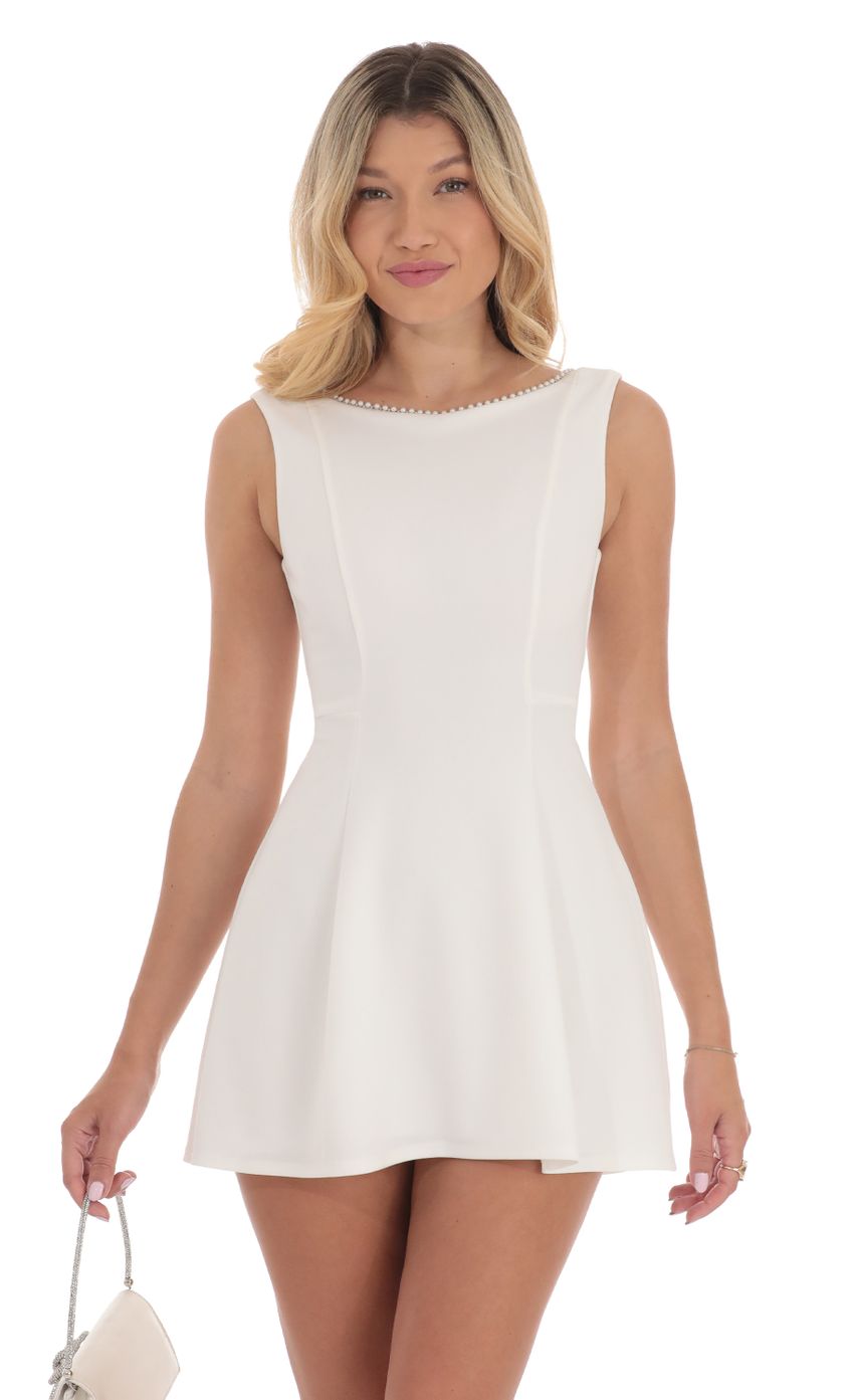 Picture Pearl Open Back A-line Dress in White. Source: https://media-img.lucyinthesky.com/data/Sep24/850xAUTO/f93dde0f-26ff-4d1e-bd55-b8984eac5385.jpg