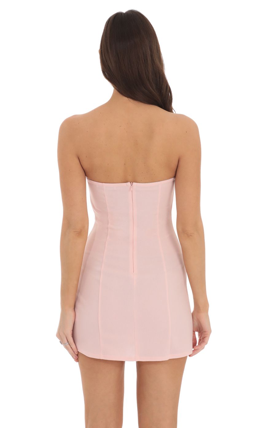 Picture White Trim Strapless Dress in Pink. Source: https://media-img.lucyinthesky.com/data/Sep24/850xAUTO/fe8ceb16-36da-43f1-a057-b59261909ed6.jpg