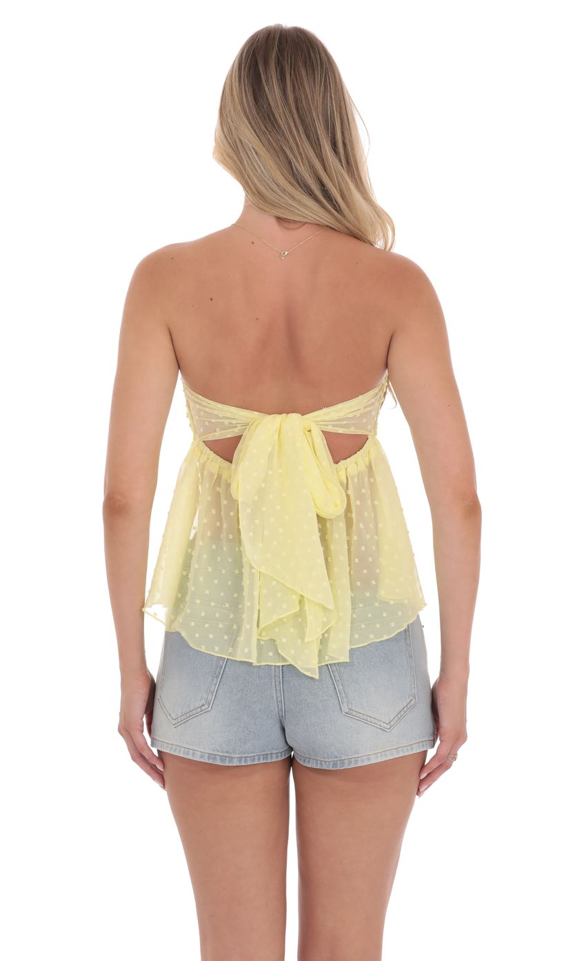 Picture Dotted Strapless Babydoll Top in Yellow. Source: https://media-img.lucyinthesky.com/data/product-media/850xAUTO/00d59905-4023-4a2b-b9e9-8fe984043e4d.jpg