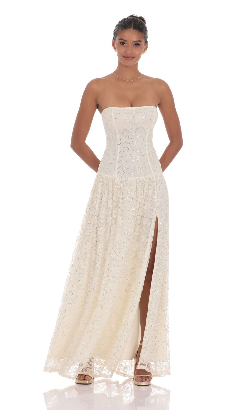 Picture Lace Sequin Drop Waist Maxi Dress in Cream. Source: https://media-img.lucyinthesky.com/data/product-media/850xAUTO/00d92244-21d0-4f0b-8e76-525887f85d24.jpg