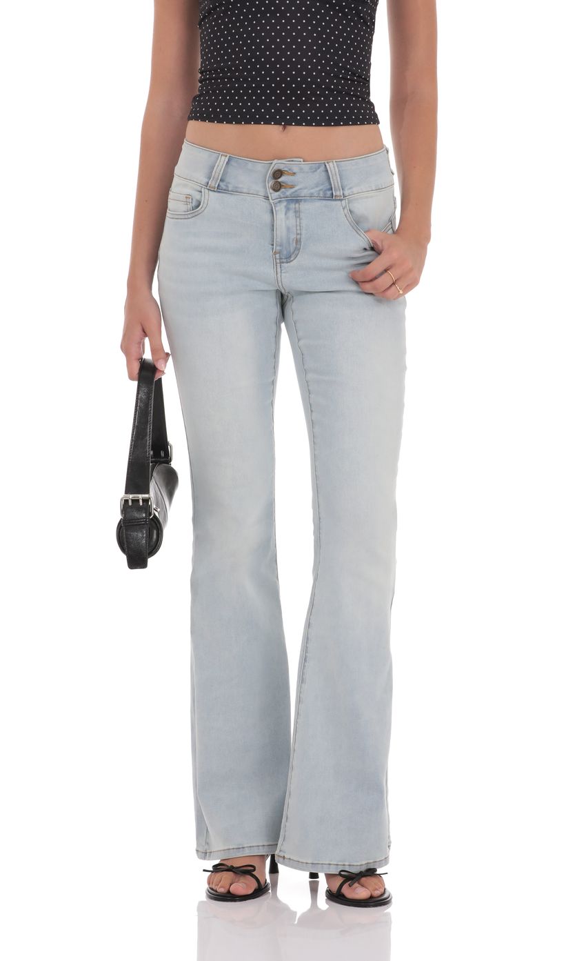 Picture Low Rise Flare Jeans in Light Denim. Source: https://media-img.lucyinthesky.com/data/product-media/850xAUTO/01873d76-63f6-4f0f-955e-d0df31724e7b.jpg