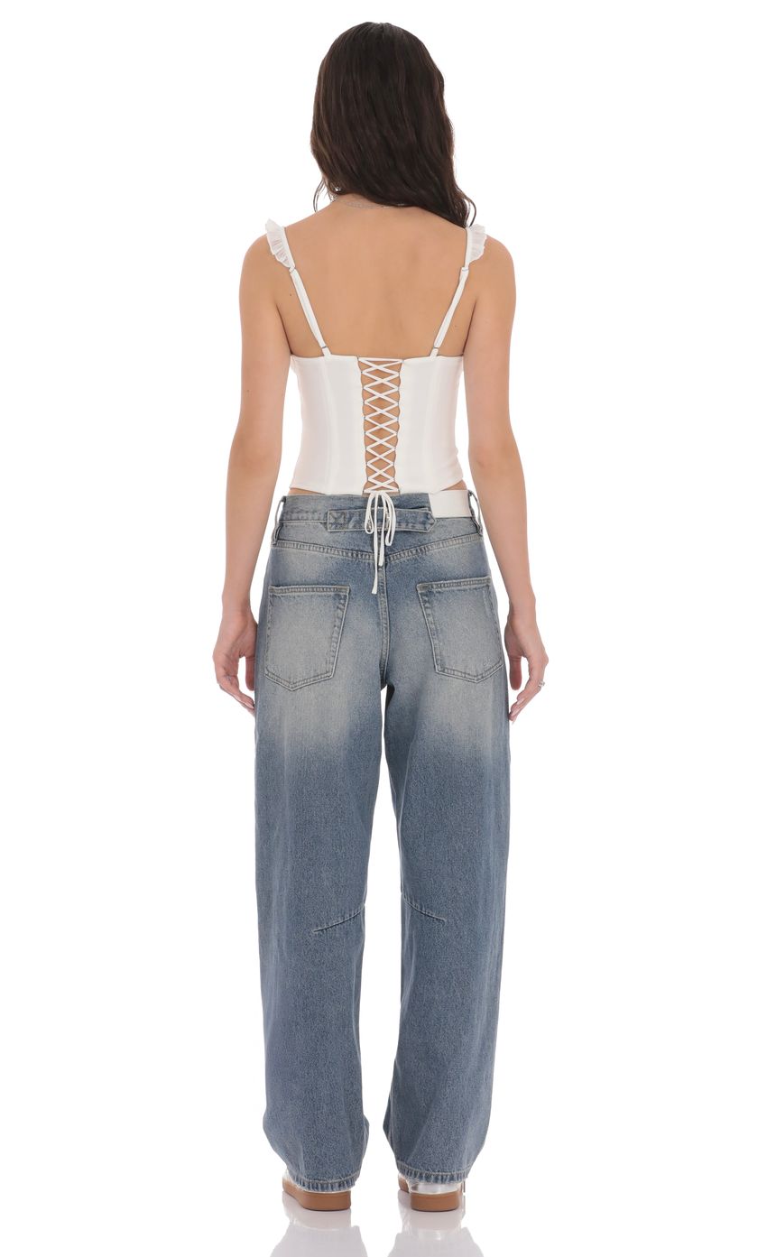 Picture Distress Barrel Jeans in Faded Denim. Source: https://media-img.lucyinthesky.com/data/product-media/850xAUTO/034d4665-6580-4e19-8183-d326af3338e5.jpg