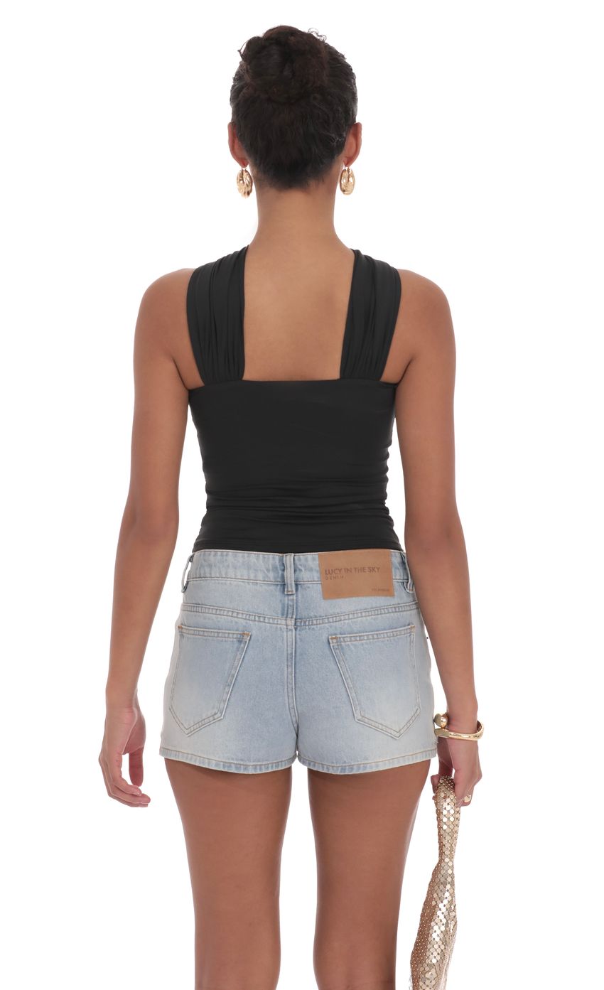 Picture Gold Embellished Top in Black. Source: https://media-img.lucyinthesky.com/data/product-media/850xAUTO/07e5909f-ee80-4e14-91db-45a6e3895a46.jpg