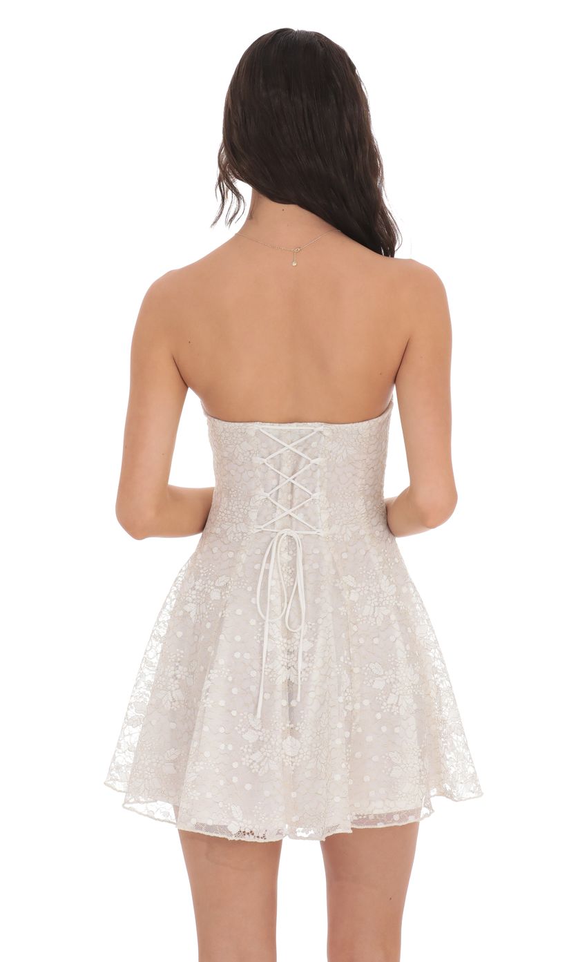Picture Gold Thread Strapless Fit and Flare Dress in Ivory. Source: https://media-img.lucyinthesky.com/data/product-media/850xAUTO/0876f2c4-5859-4178-86a7-7966fbb7cbb8.jpg