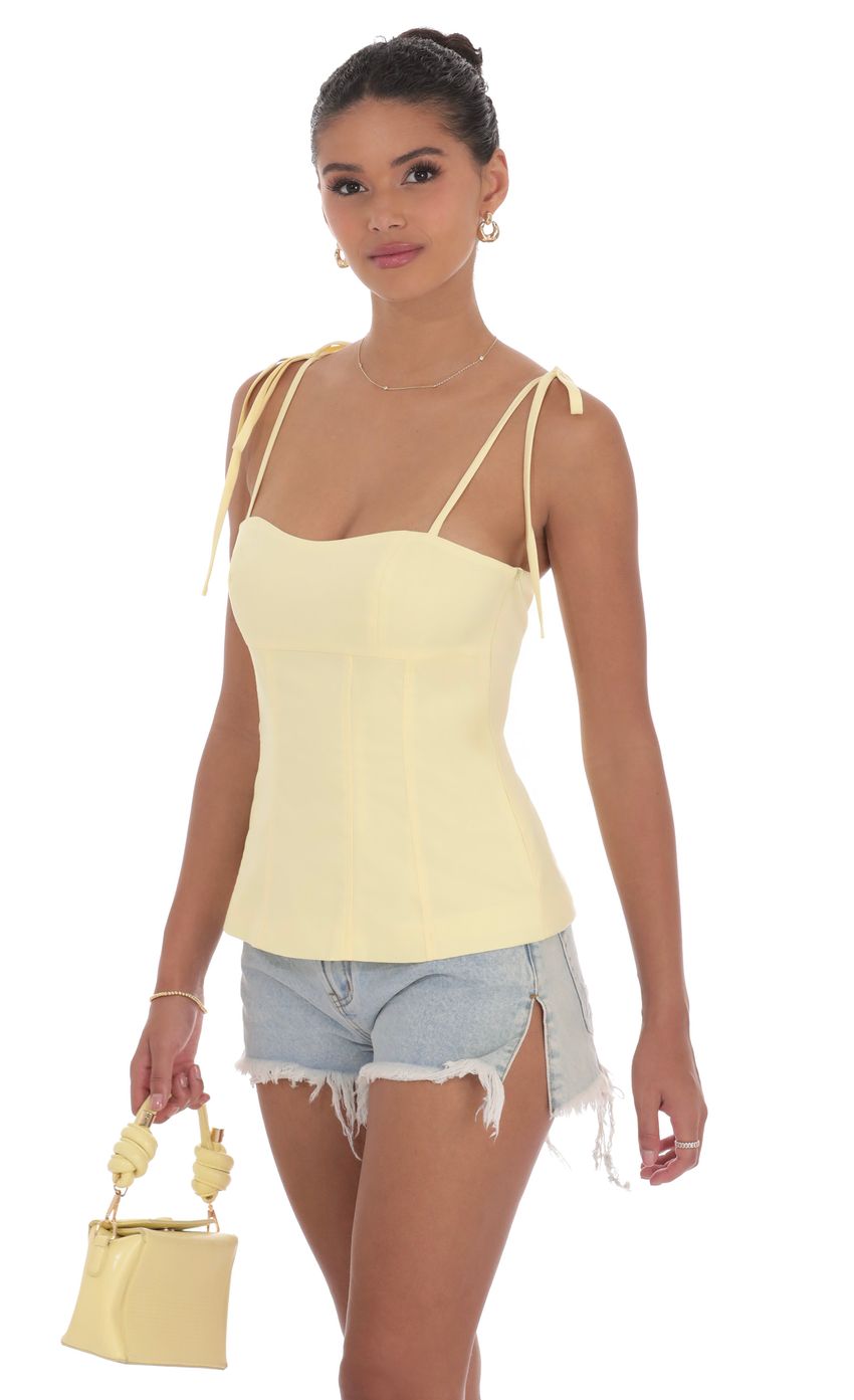 Picture Flare Top in Yellow. Source: https://media-img.lucyinthesky.com/data/product-media/850xAUTO/0918991f-0073-4adc-9f98-e64f19db5691.jpg