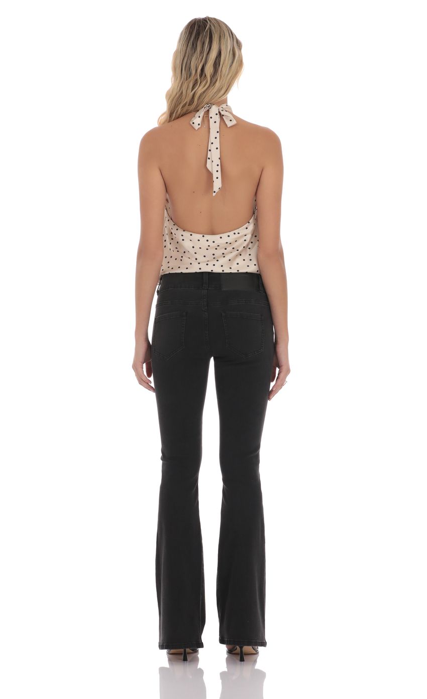 Picture Low Rise Flare Jeans in Black. Source: https://media-img.lucyinthesky.com/data/product-media/850xAUTO/09abfb78-3c4b-4ca1-b22d-a3ff24eadf7c.jpg
