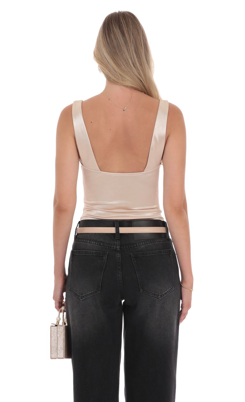 Picture Satin Bodysuit in Champagne. Source: https://media-img.lucyinthesky.com/data/product-media/850xAUTO/0a0049d5-e657-42f4-a9c9-6dcbecb76246.jpg