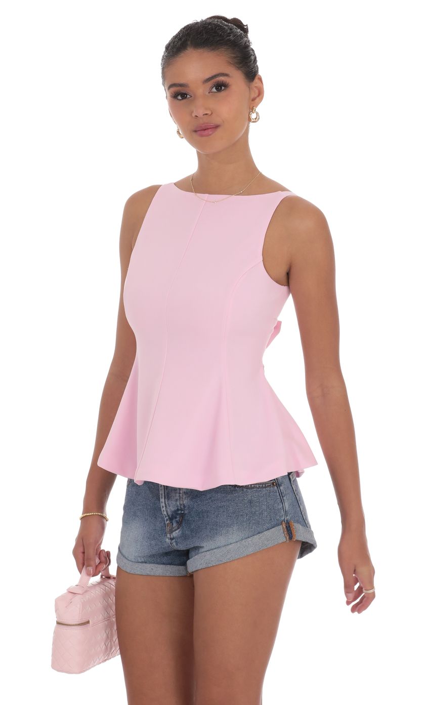 Picture High Neck Back Bow Top in Pink. Source: https://media-img.lucyinthesky.com/data/product-media/850xAUTO/0c37f815-e7d5-415f-a950-359d1e275900.jpg