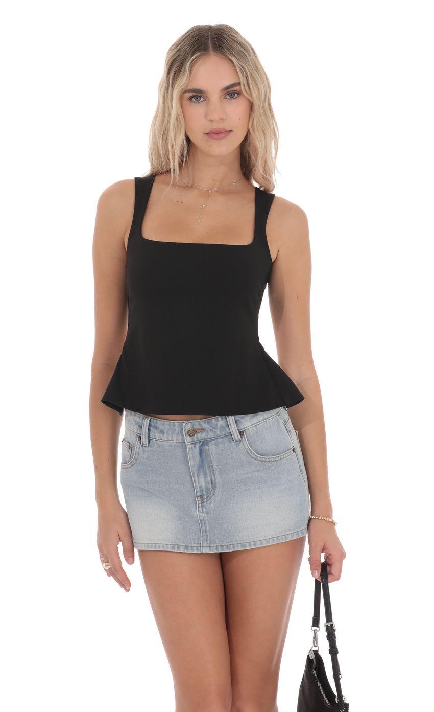 Picture Pearl Open back Top in Black. Source: https://media-img.lucyinthesky.com/data/product-media/850xAUTO/0d79019f-3f16-42fc-a1e8-e21a45688a9c.jpg