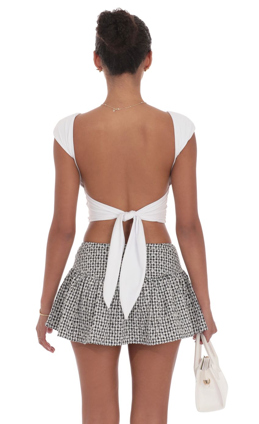 Picture Floral Flare Skort in Black Gingham. Source: https://media-img.lucyinthesky.com/data/product-media/850xAUTO/0ef2ef61-05d7-455f-aa4f-3c091d0666f3.jpg