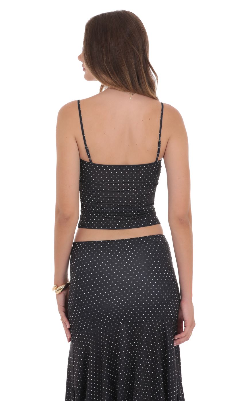 Picture Polka Dot Ruched Bust Top in Black. Source: https://media-img.lucyinthesky.com/data/product-media/850xAUTO/0ef996da-dc21-441f-9b97-2157a31ac9f2.jpg