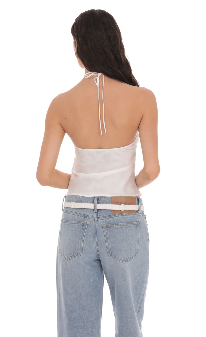 Picture Satin Jacquard Halter Top in White. Source: https://media-img.lucyinthesky.com/data/product-media/850xAUTO/1010efa3-7c9f-4b32-981a-b6174acebc88.jpg