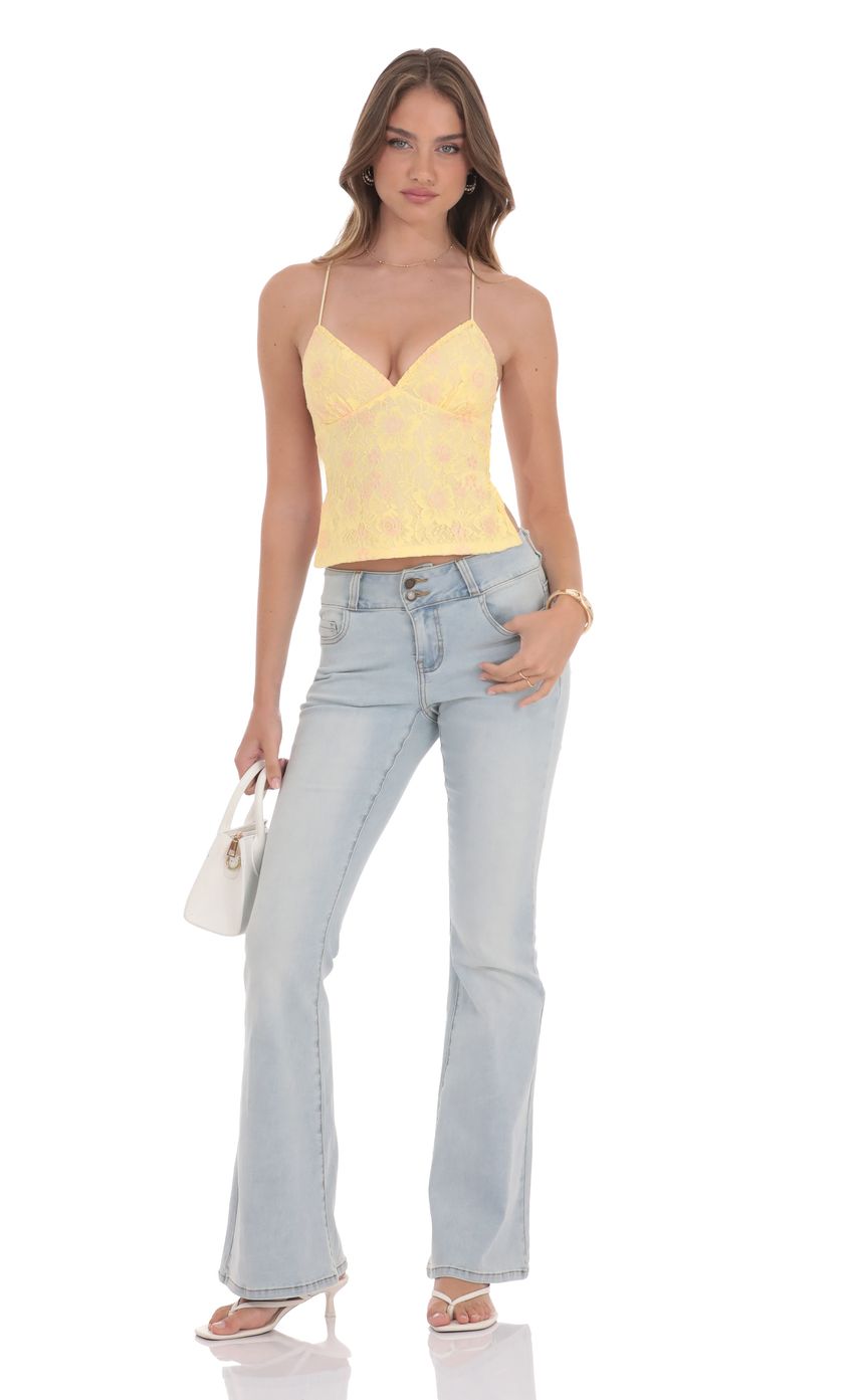 Picture Open Back Lace Top in Yellow. Source: https://media-img.lucyinthesky.com/data/product-media/850xAUTO/11d61122-1b29-4f6b-a1f0-c9ca708bf30f.jpg