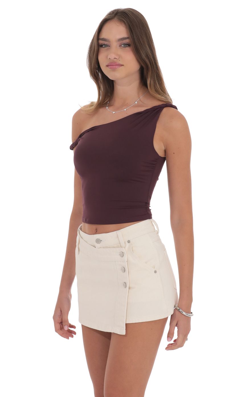 Picture Overlap Button Denim Skirt in Cream. Source: https://media-img.lucyinthesky.com/data/product-media/850xAUTO/1308d762-cbad-4daf-b749-cca511c1a994.jpg