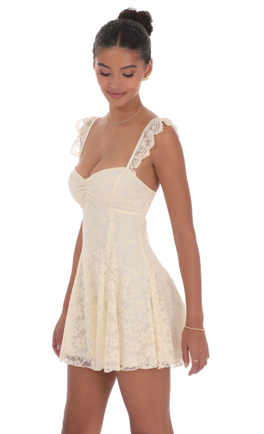 Picture Lace Fit and Flare Dress in Cream. Source: https://media-img.lucyinthesky.com/data/product-media/850xAUTO/133e8219-c656-492e-9a89-6d059176edc4.jpg