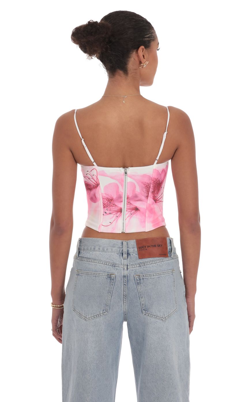 Picture Pointed Floral Corset Top in White. Source: https://media-img.lucyinthesky.com/data/product-media/850xAUTO/13e8e732-9c91-4d8a-80c8-20f37830ed06.jpg