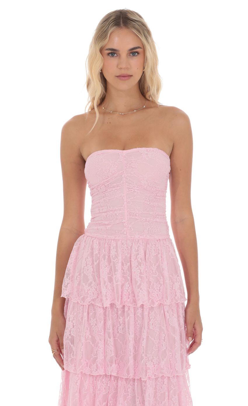 Picture Lace Ruched Ruffle Maxi Dress in Pink. Source: https://media-img.lucyinthesky.com/data/product-media/850xAUTO/19bfedb7-7ffe-4415-a8ed-c0fe0b5c73b4.jpg