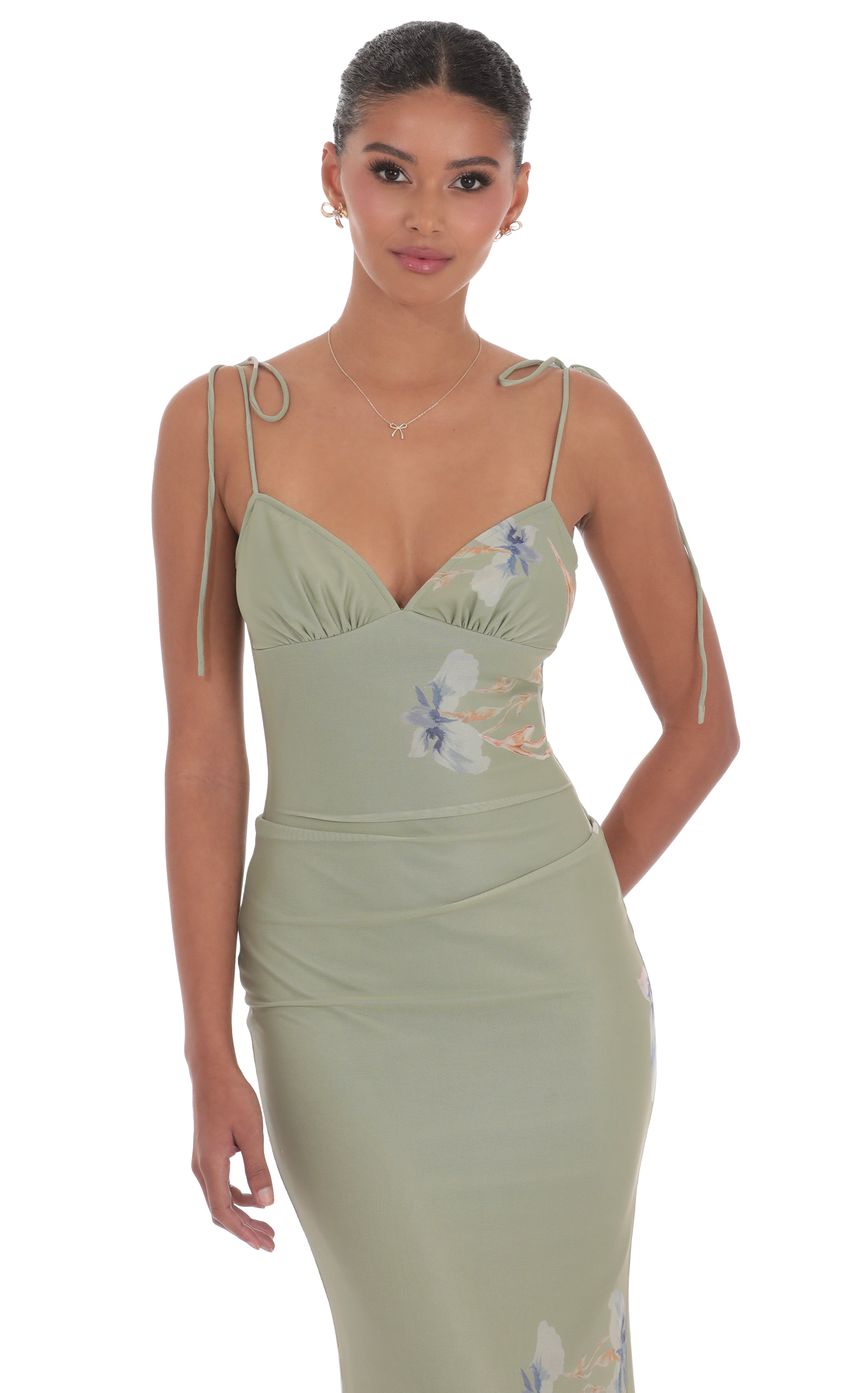 Picture Floral Back Ruffle Maxi Dress in Sage. Source: https://media-img.lucyinthesky.com/data/product-media/850xAUTO/1a3c1129-d621-4170-a1b1-78bc75b59b28.jpg
