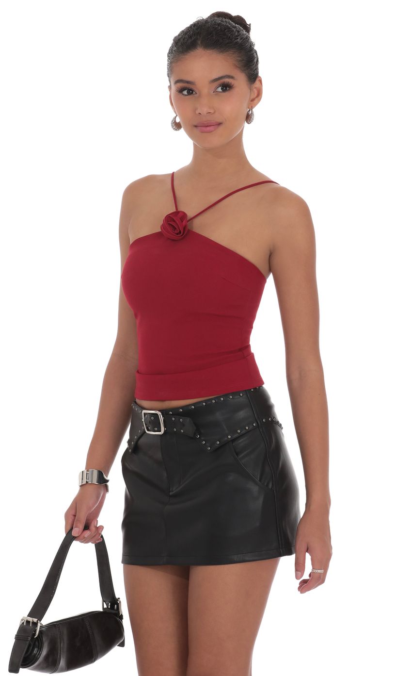 Picture Studded Belt Faux Leather Skirt in Black. Source: https://media-img.lucyinthesky.com/data/product-media/850xAUTO/1b5c6480-97c9-4d21-8f0b-696ce4e52cb0.jpg
