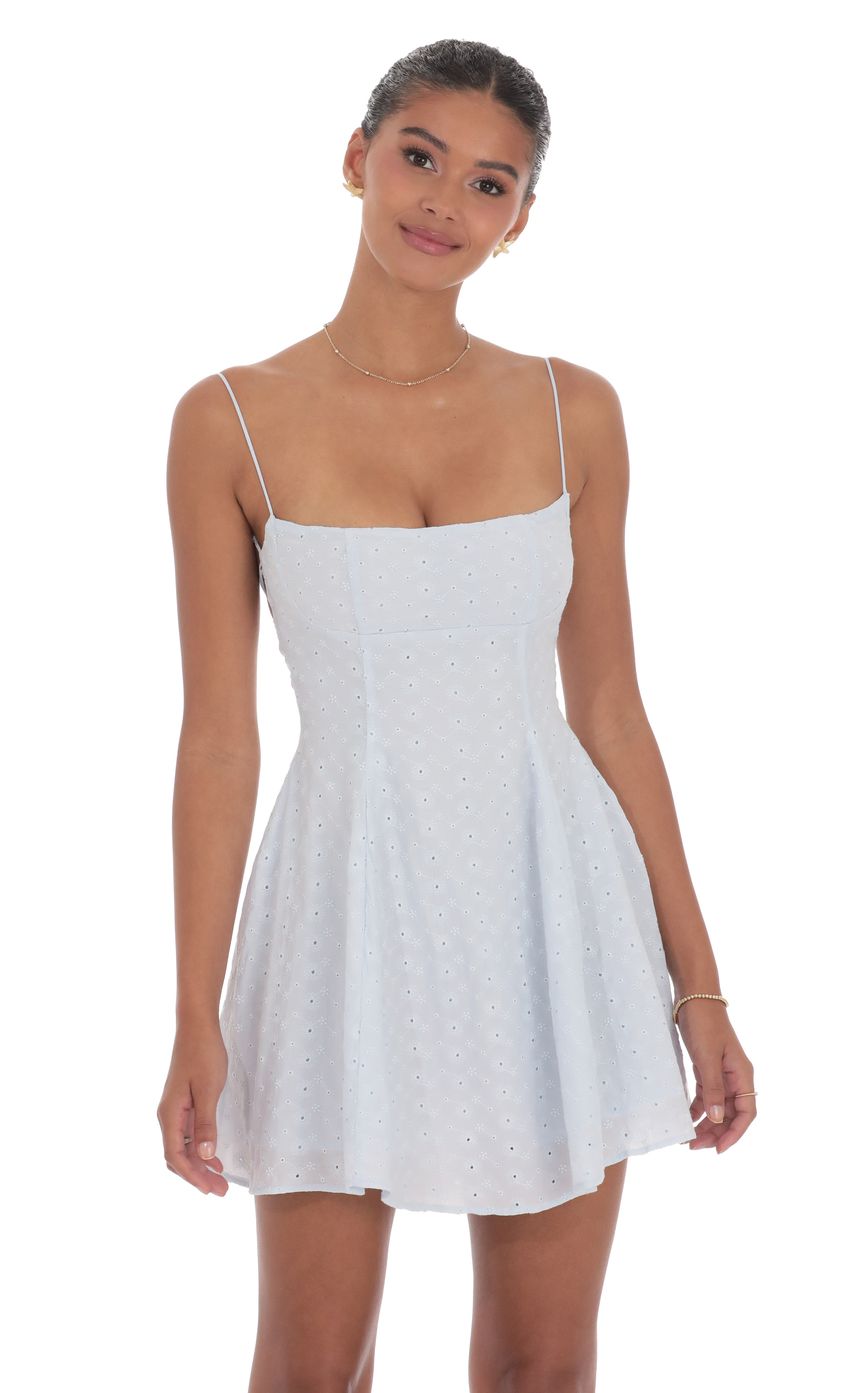 Picture Floral Eyelet Fit and Flare Dress in Light Blue. Source: https://media-img.lucyinthesky.com/data/product-media/850xAUTO/1caeec6e-68b7-4f02-b04e-fd98ebcc8ff6.jpg