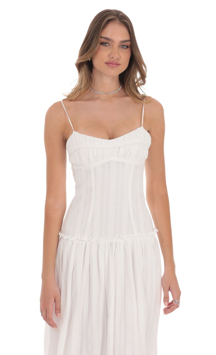 Picture Embroidered Striped Maxi Dress in White. Source: https://media-img.lucyinthesky.com/data/product-media/850xAUTO/2032802b-a64c-40fc-b250-cfe5aed5b5b9.jpg
