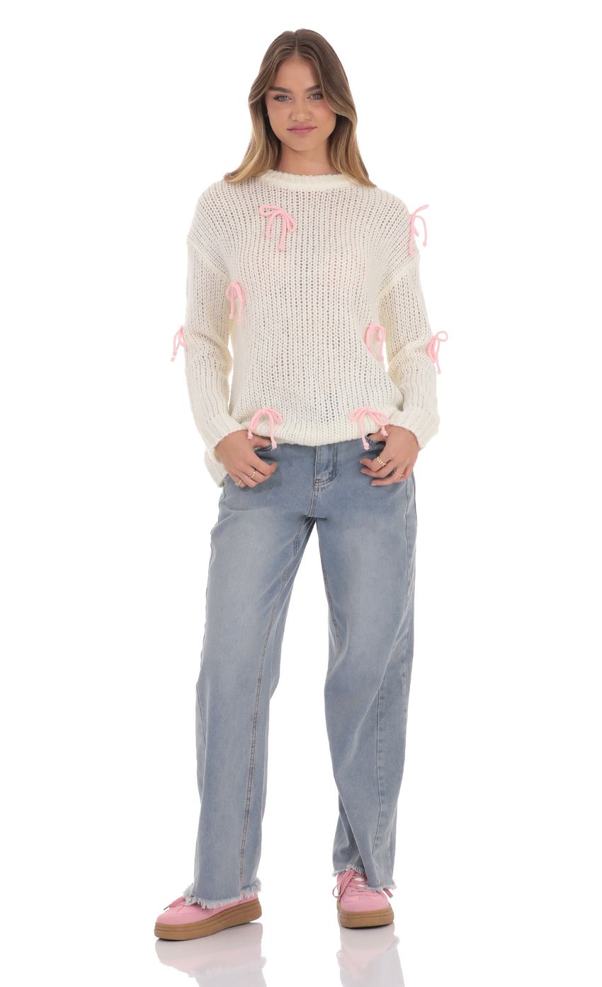 Picture Knitted Bows Jumper in Cream. Source: https://media-img.lucyinthesky.com/data/product-media/850xAUTO/20eced20-690a-46c7-abde-cb86816a0ed2.jpg