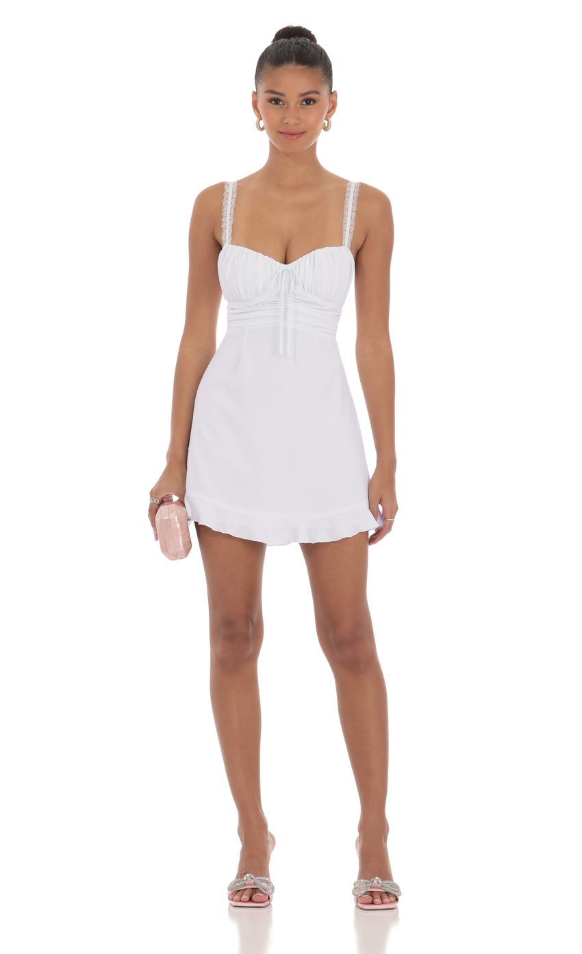 Picture Lace Strap Open Back Dress in Off White. Source: https://media-img.lucyinthesky.com/data/product-media/850xAUTO/2175633d-b445-488f-934e-82875baa3a8d.jpg