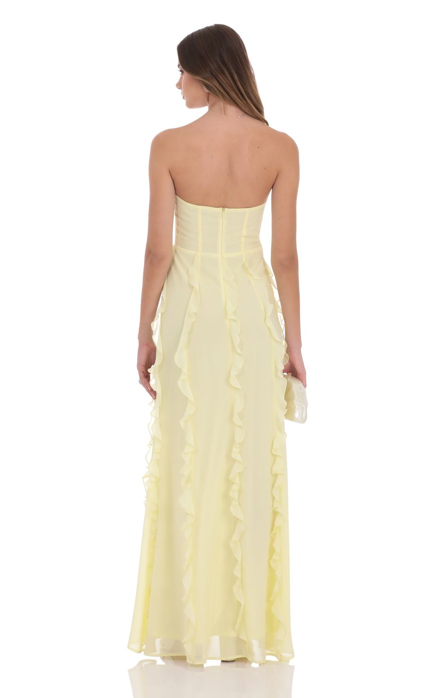 Picture Chiffon Rossette Ruffle Maxi Dress in Yellow. Source: https://media-img.lucyinthesky.com/data/product-media/850xAUTO/22a66b7d-1f9a-4e18-88e9-54f53c04a0ee.jpg