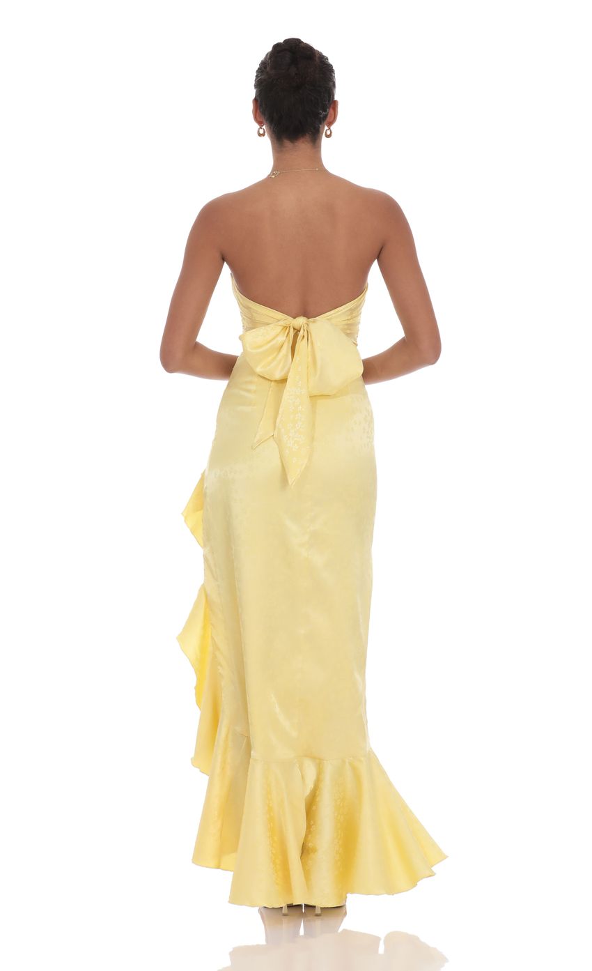Picture Satin Jacquard Back Bow Corset Maxi Dress in Yellow. Source: https://media-img.lucyinthesky.com/data/product-media/850xAUTO/27b1b160-7b6e-4b26-bc45-ca74842c3b1a.jpg