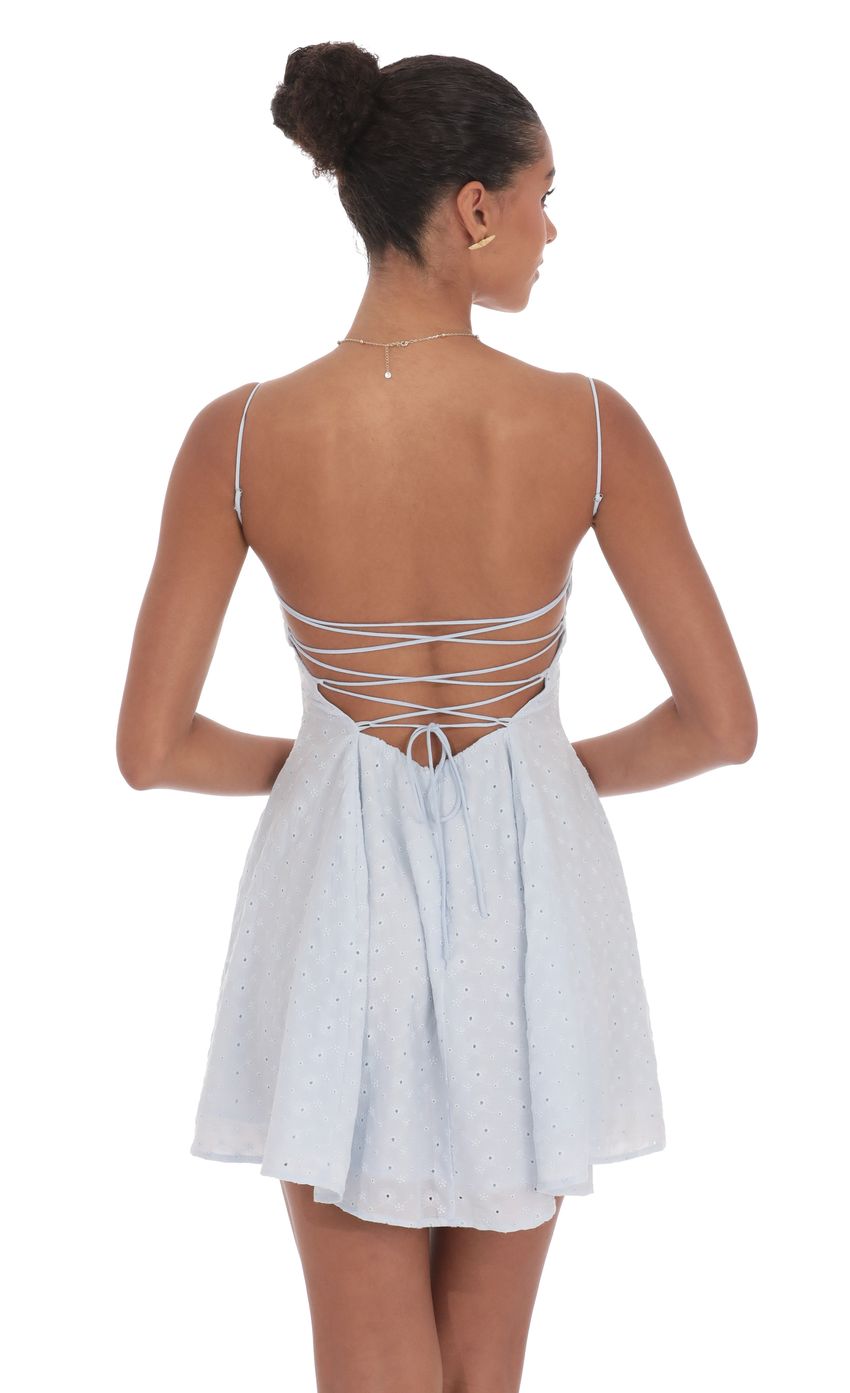 Picture Floral Eyelet Fit and Flare Dress in Light Blue. Source: https://media-img.lucyinthesky.com/data/product-media/850xAUTO/2900e6ed-ea2b-4cad-bc81-6c5940f89194.jpg