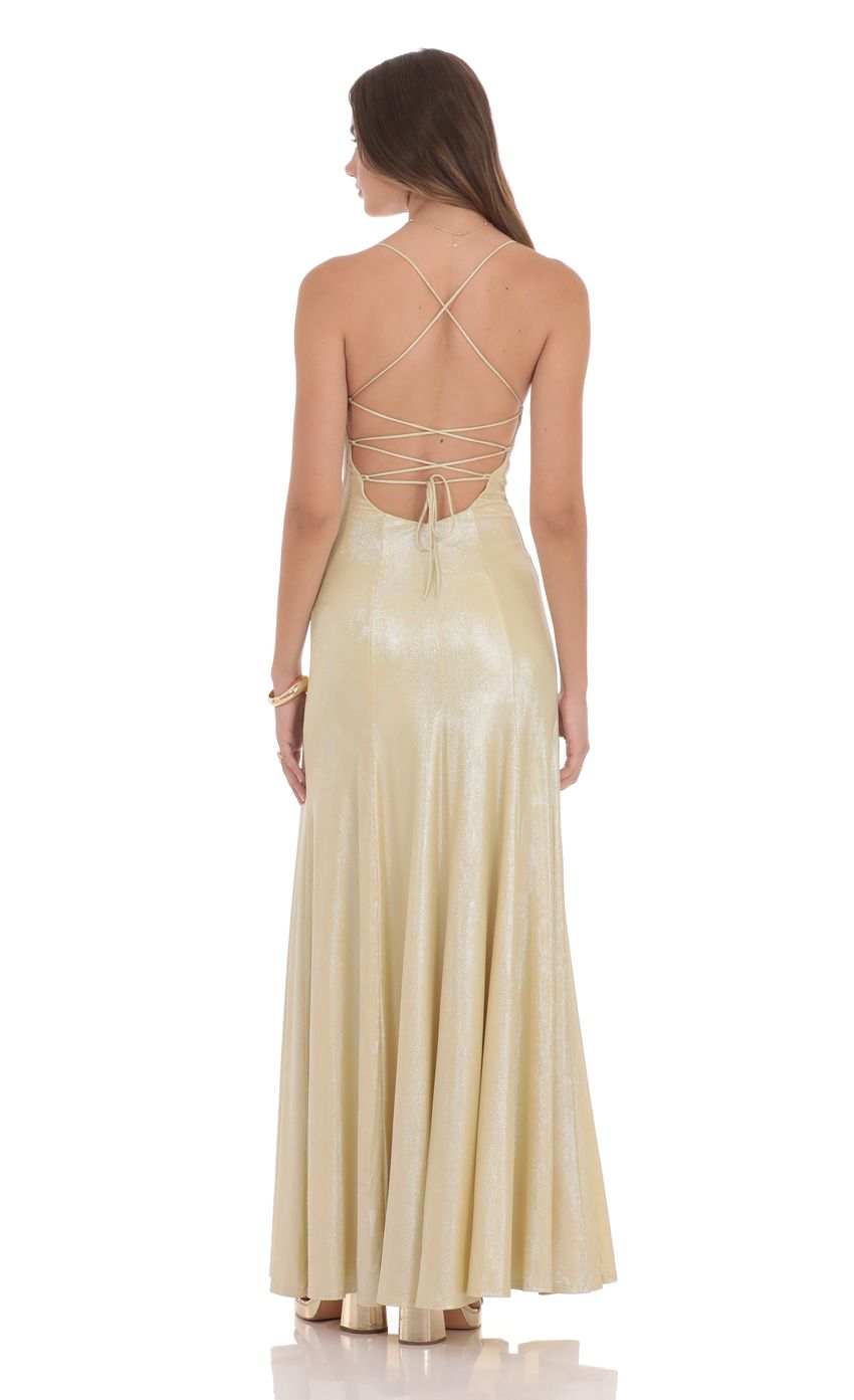 Picture Shimmer Draped Open Back Maxi Dress in Gold. Source: https://media-img.lucyinthesky.com/data/product-media/850xAUTO/2c6fdff9-d793-4654-9f59-d492bcb61620.jpg