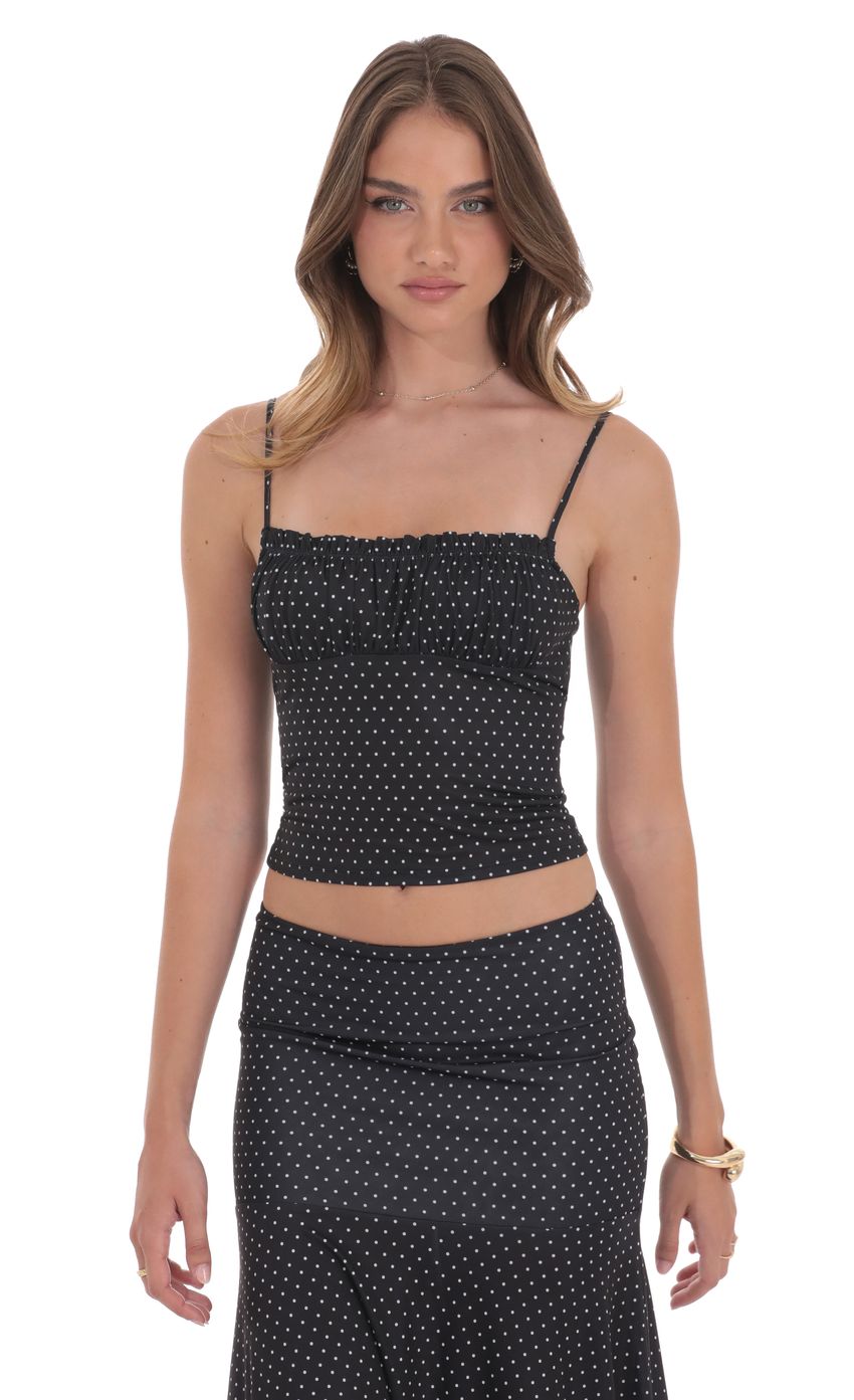 Picture Polka Dot Ruched Bust Top in Black. Source: https://media-img.lucyinthesky.com/data/product-media/850xAUTO/2dc7fd1f-e683-4648-95eb-8eac9fd5ef08.jpg