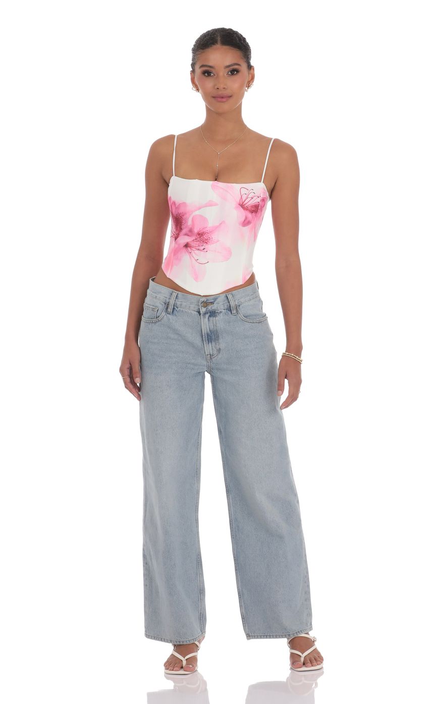 Picture Pointed Floral Corset Top in White. Source: https://media-img.lucyinthesky.com/data/product-media/850xAUTO/2f50e445-3220-4dbe-bdac-1e403822bcab.jpg