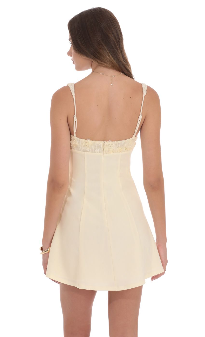 Picture Florette Bust Skater Dress in Cream. Source: https://media-img.lucyinthesky.com/data/product-media/850xAUTO/2ff89610-23d7-4328-a668-f2ce2ce2df0b.jpg