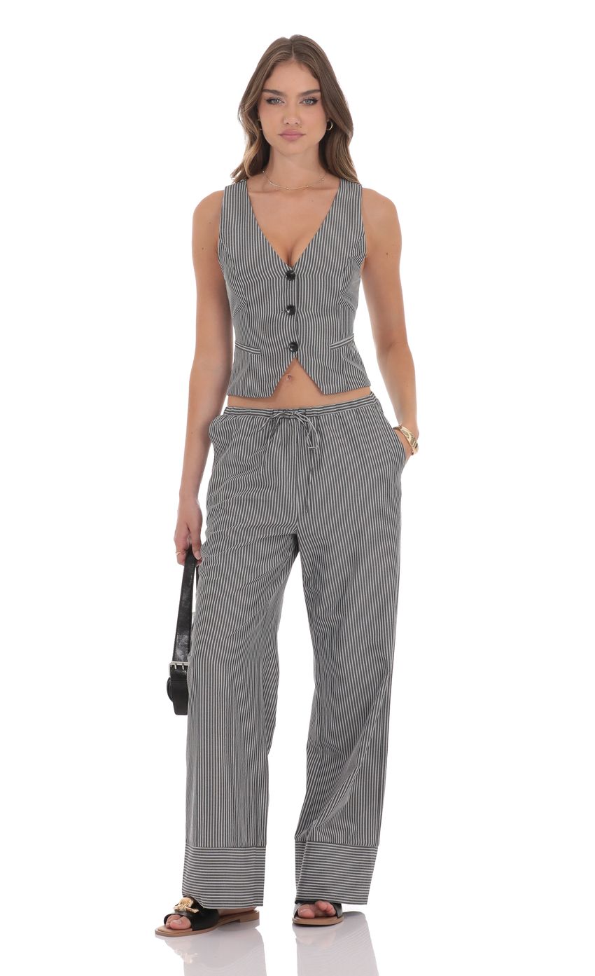 Picture Pinstripe Buttoned Vest in Grey. Source: https://media-img.lucyinthesky.com/data/product-media/850xAUTO/349377f5-f28c-4246-9841-e623ee22b7c4.jpg