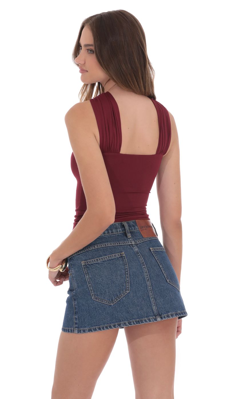 Picture Gold Embellished Top in Burgundy. Source: https://media-img.lucyinthesky.com/data/product-media/850xAUTO/35650916-bbe8-4a50-b2b2-e7f23469ad95.jpg
