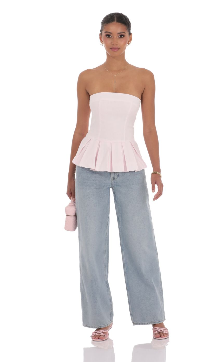 Picture Strapless Peplum Top in Pink. Source: https://media-img.lucyinthesky.com/data/product-media/850xAUTO/35dfa796-4365-4458-9a3f-a23e7418db5e.jpg