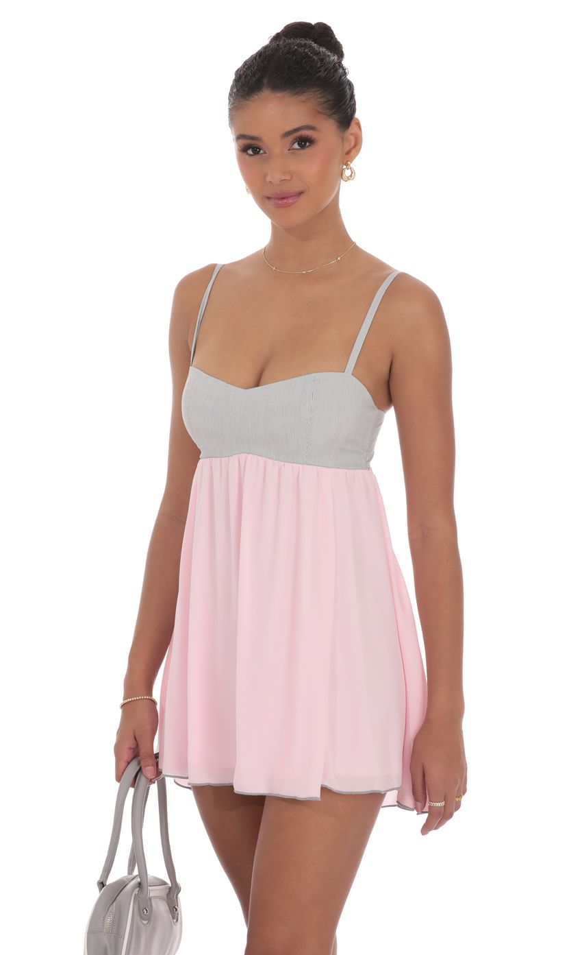 Picture Two Toned Striped Babydoll Dress in Pink. Source: https://media-img.lucyinthesky.com/data/product-media/850xAUTO/361aaefa-fbb3-4c3a-b54e-bdb5bc718641.jpg