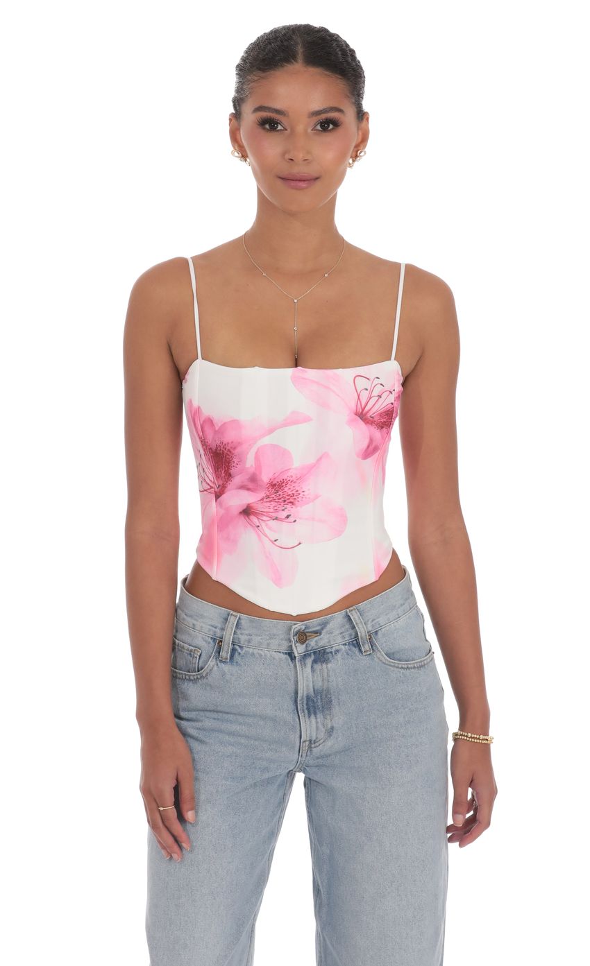 Picture Pointed Floral Corset Top in White. Source: https://media-img.lucyinthesky.com/data/product-media/850xAUTO/3dbbc6e6-5052-45e6-ba3b-d884bef35699.jpg