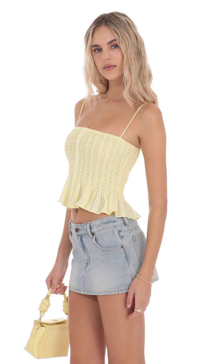 Picture Smocked Button Top in Yellow. Source: https://media-img.lucyinthesky.com/data/product-media/850xAUTO/3e982e77-da39-4ea1-800e-44c5ba3618f6.jpg