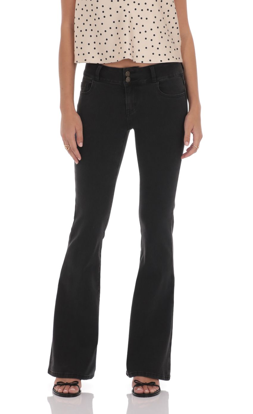 Picture Low Rise Flare Jeans in Black. Source: https://media-img.lucyinthesky.com/data/product-media/850xAUTO/3ed4499f-ef37-4d0e-aff6-759c85ade45d.jpg