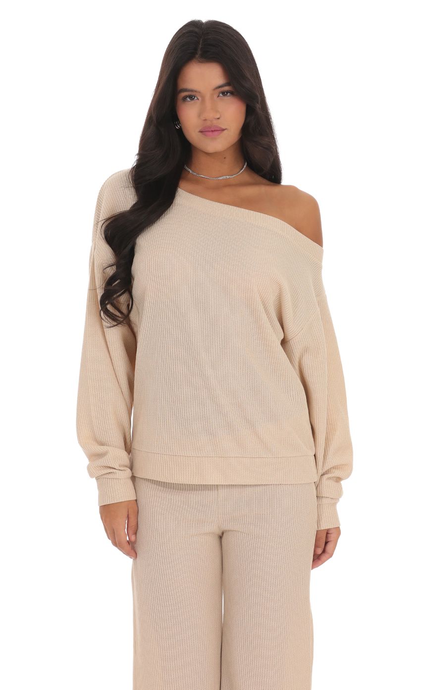 Picture Off Shoulder Knit Oversized Jumper in Beige. Source: https://media-img.lucyinthesky.com/data/product-media/850xAUTO/4042ad3f-8fd8-4d6b-a178-13e68d6fb361.jpg