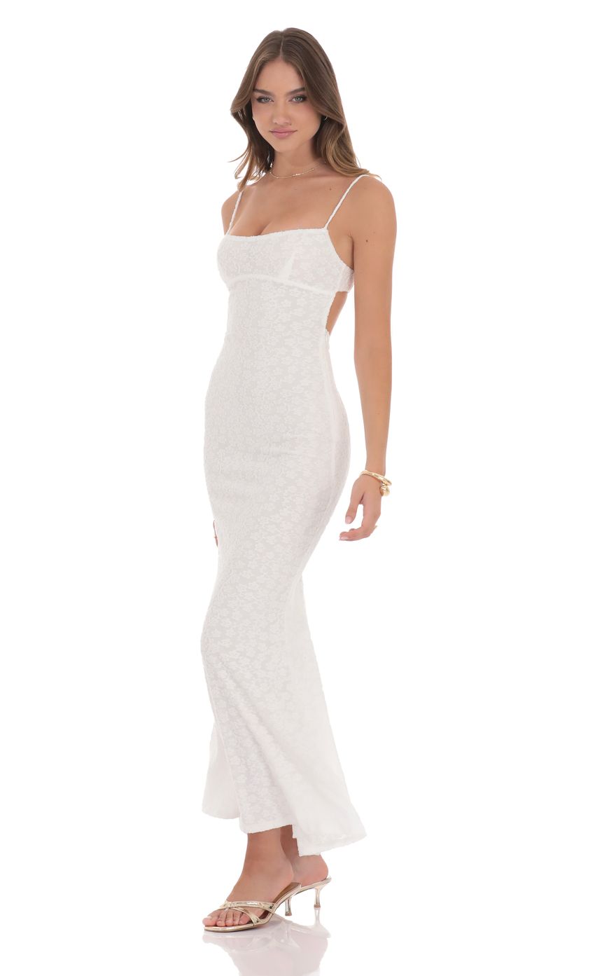 Picture Textured Floral Maxi Dress in White. Source: https://media-img.lucyinthesky.com/data/product-media/850xAUTO/4179ae83-9f2b-4ff9-9a3b-68a00f7e225a.jpg