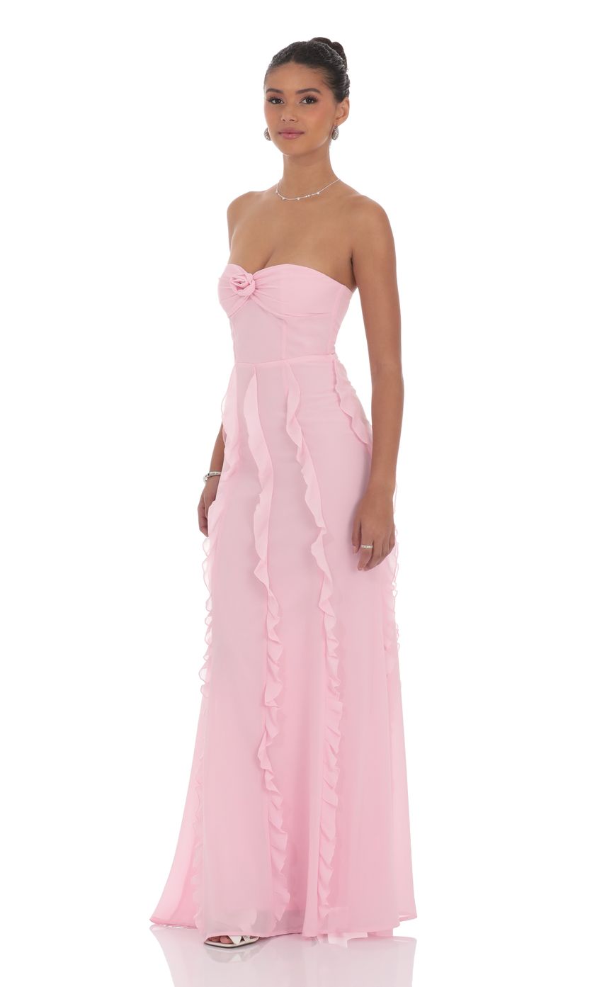 Picture Chiffon Rossette Ruffle Maxi Dress in Pink. Source: https://media-img.lucyinthesky.com/data/product-media/850xAUTO/44177f43-3c1e-476c-bd30-5d482a039c73.jpg