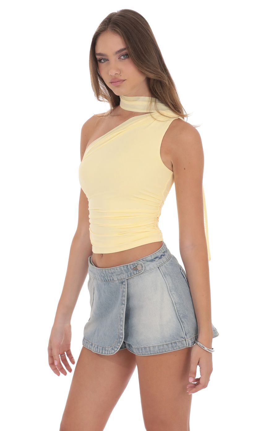 Picture Scarf Halter Top in Yellow. Source: https://media-img.lucyinthesky.com/data/product-media/850xAUTO/472209d2-1252-4906-99cf-7159b1835e03.jpg