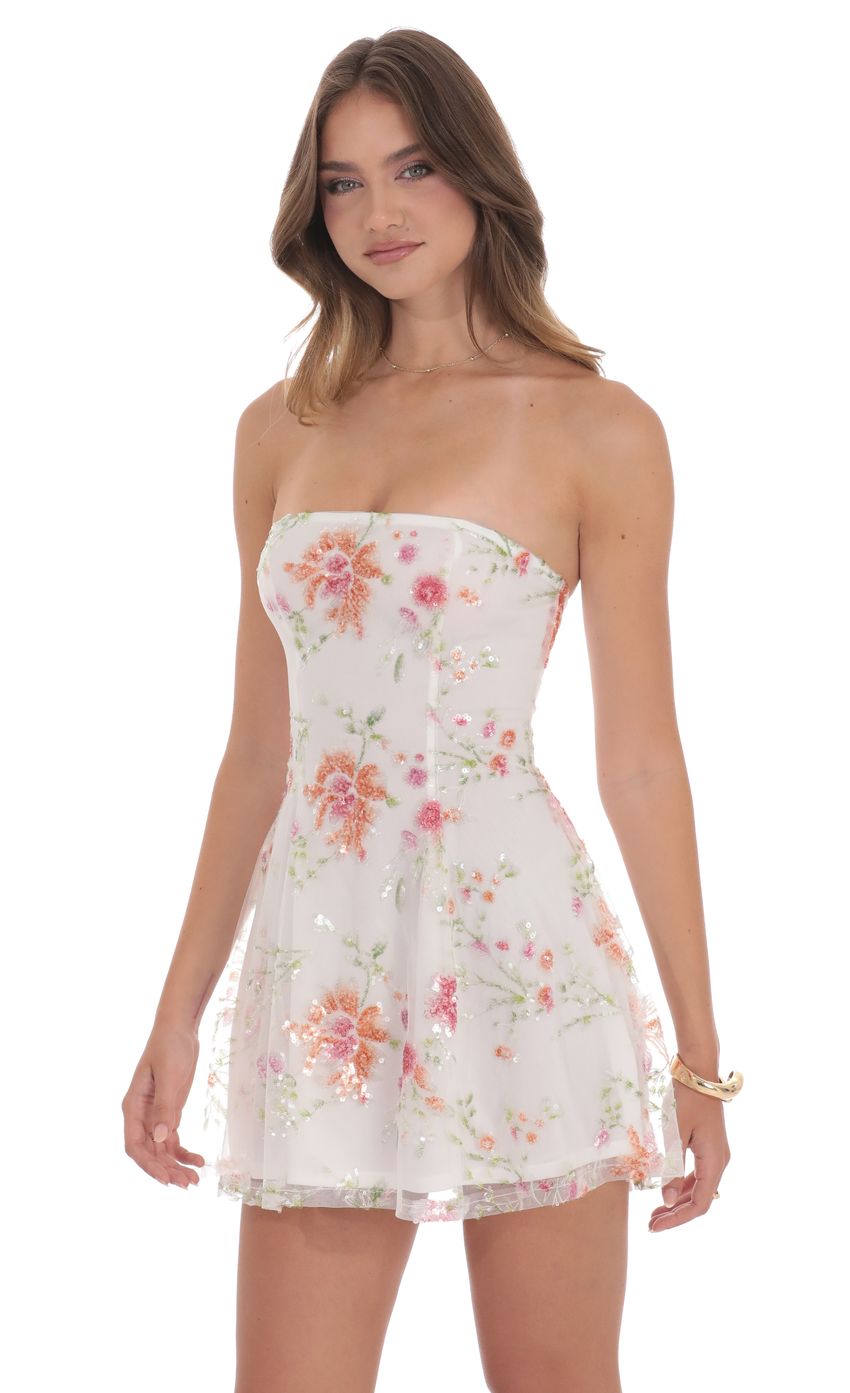 Picture Sequin Floral Strapless Dress in White. Source: https://media-img.lucyinthesky.com/data/product-media/850xAUTO/4757fc2e-104d-4c58-afaf-6bad5a150d0b.jpg