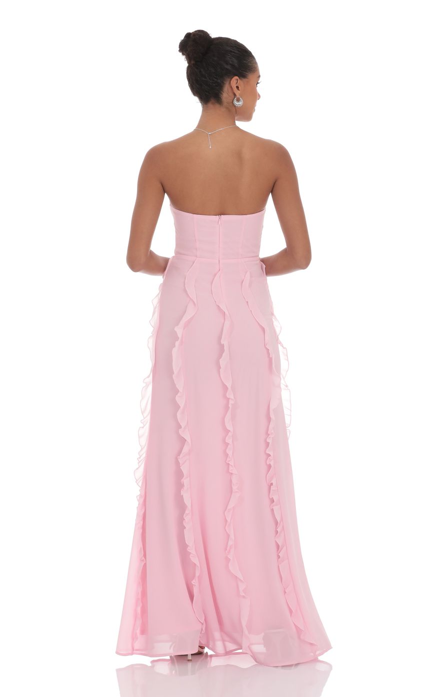 Picture Chiffon Rossette Ruffle Maxi Dress in Pink. Source: https://media-img.lucyinthesky.com/data/product-media/850xAUTO/48102eb5-38cb-463c-aa67-518ce8350245.jpg